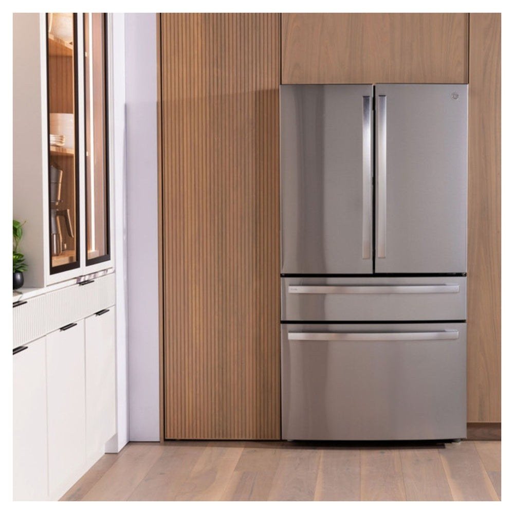 Stainless French-door refrigerator in a wood-paneled kitchen nook